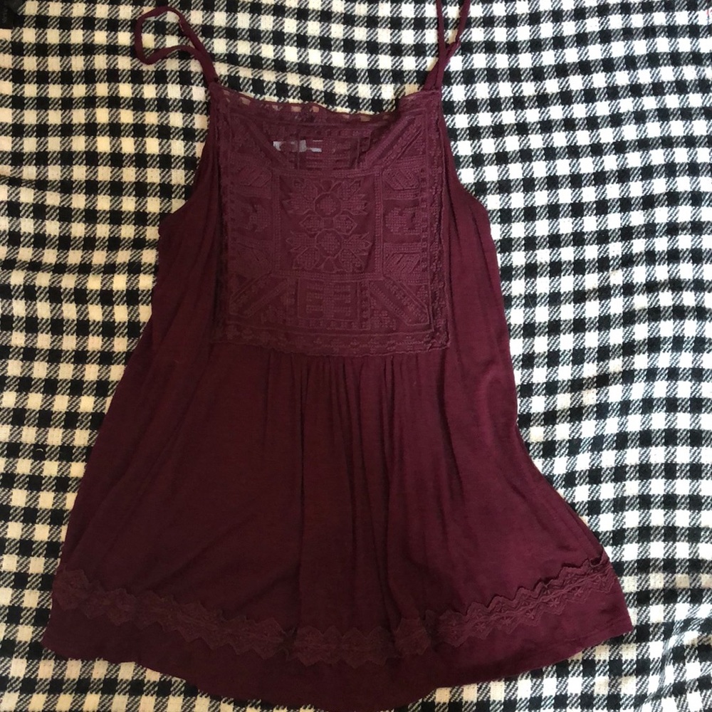 Maurice’s burgundy tank